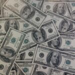 Hundred dollar bills.