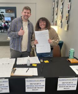 Buddy and Sophie collecting signatures